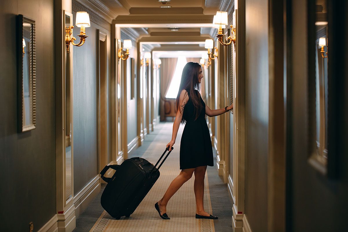 Woman going to hotel room