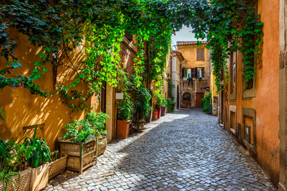 Old street in Trastevere, Rome, Italy. Trastevere is rione of Rome, on the west bank of the Tiber in Rome, Lazio, Italy. Architecture and landmark of Rome