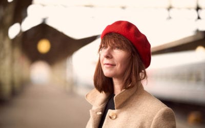 Close up portrait of older woman traveller