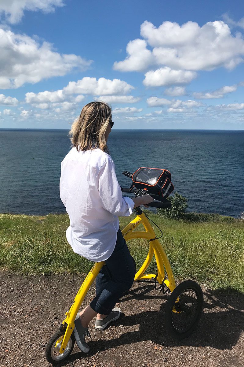 Elizabeth on her ALinker looks over the ocean