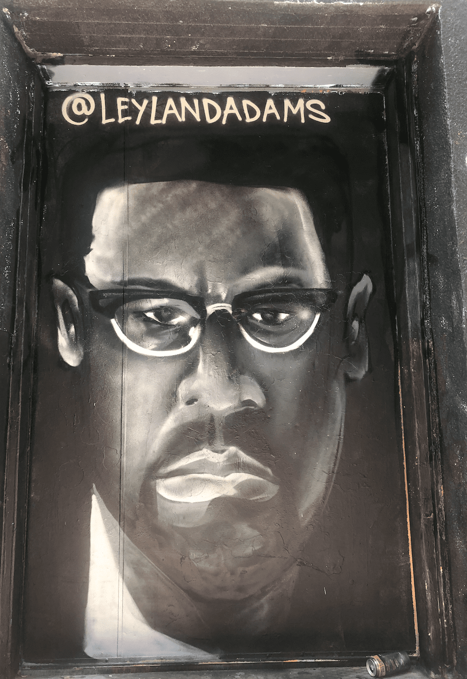 Graffiti portrait of Malcom X in Graffiti Alley, Toronto, ON