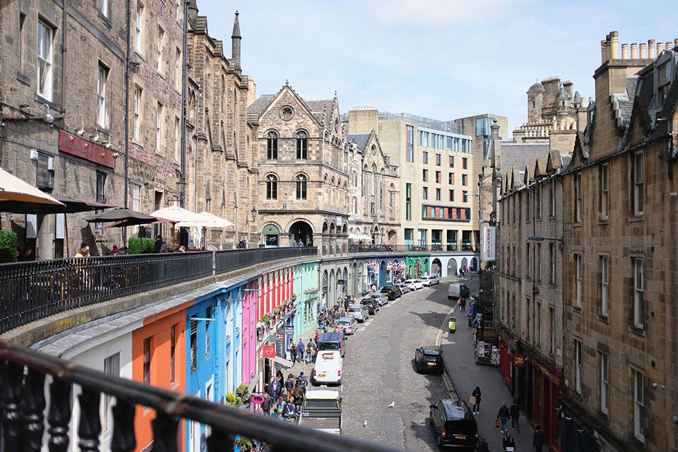 A view of Edinburgh buildings from a balcony