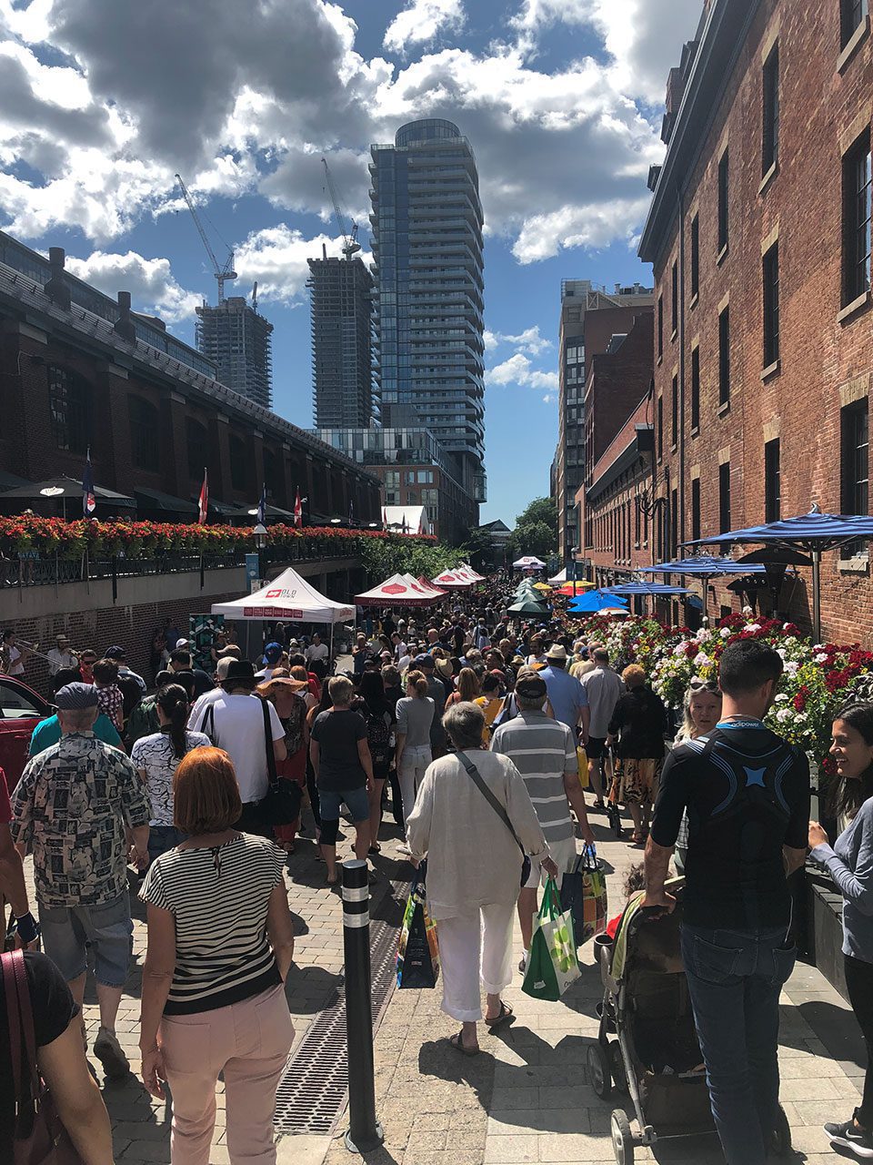 Crowds walking the Distillery District, Toronto