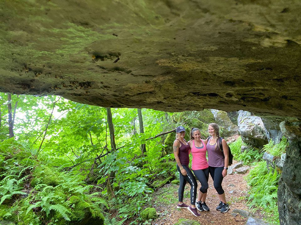 Amanda and her friends explore Grieg's Cave in Tobermory