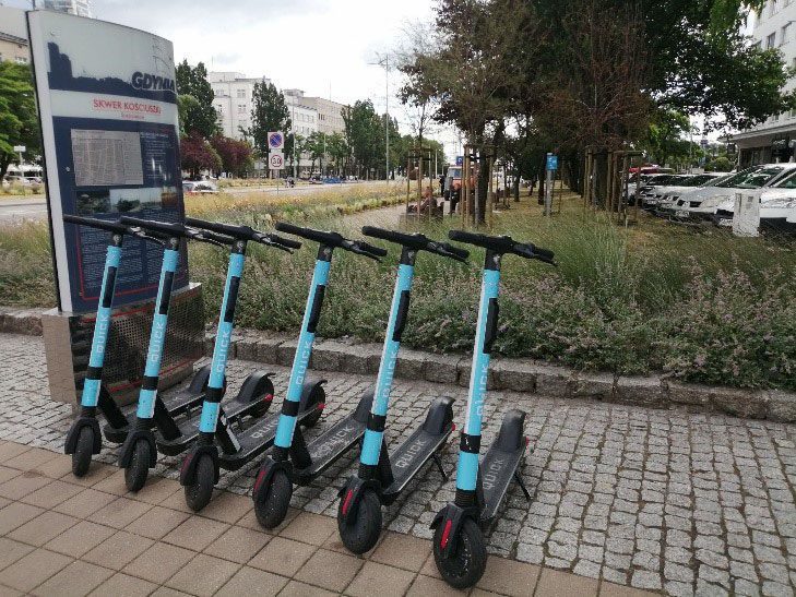Row of electric scooters lined up. They are popular in North Poland