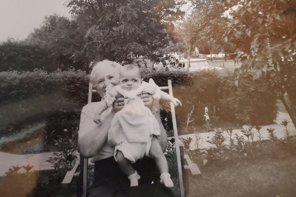 Vintage photo showing author Marion as a baby with her Grandmother Minnie
