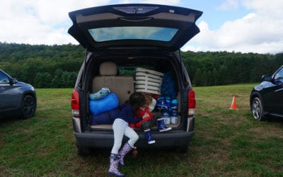 Two kids and a packed car