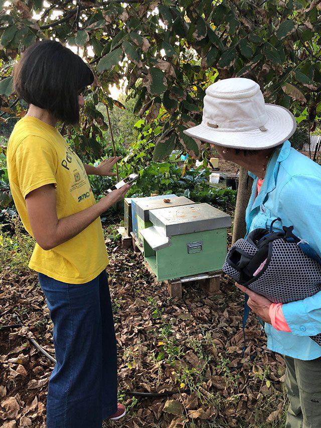 Tita with a beekeeper in Italy
