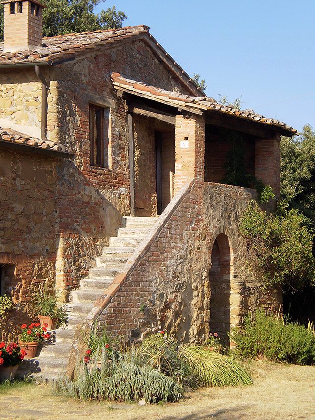 stone exterior of a Tuscan villa