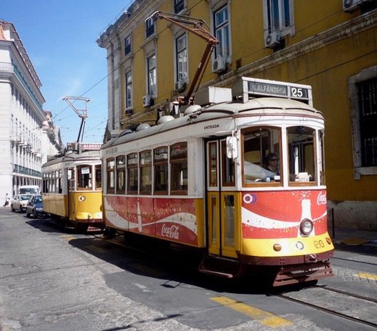 Classic trams roam the streets of Lisbon, Portugal