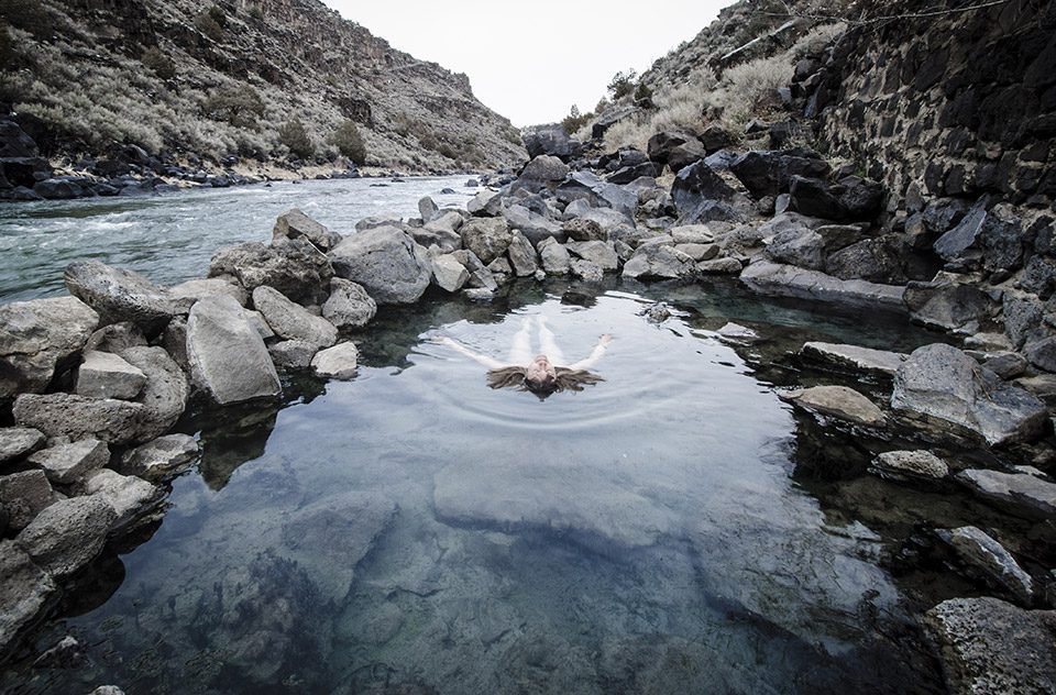 Woman floats in hot springs in New Mexico