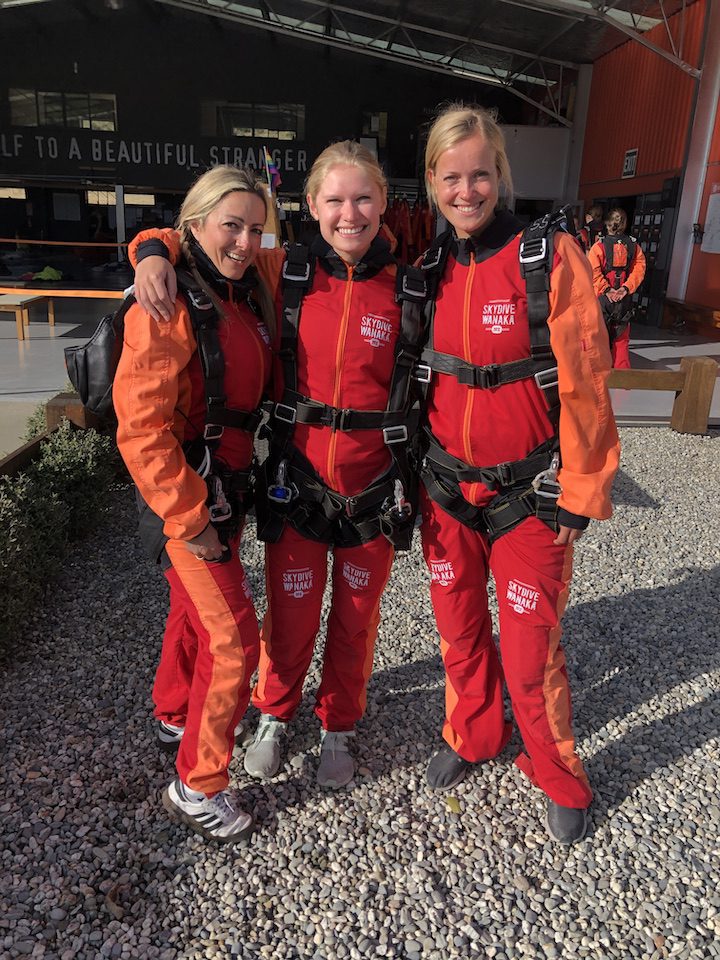 Amanda, Lucie (centre) and Kyra (right) all suited up to jump out of a plane in Wanaka, New Zealand
