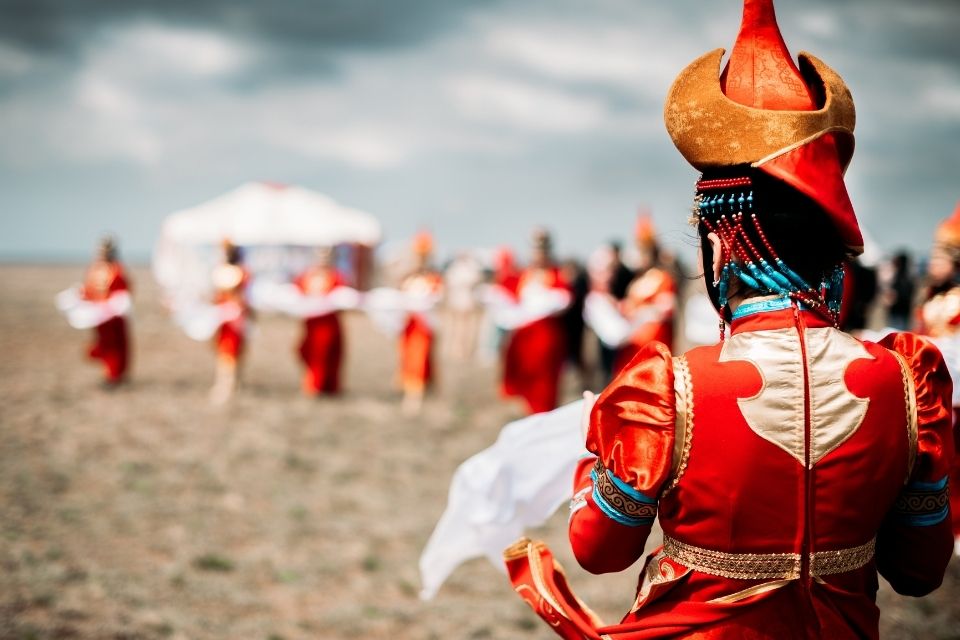 Traditionally dressed young woman at festival in Mongolia
