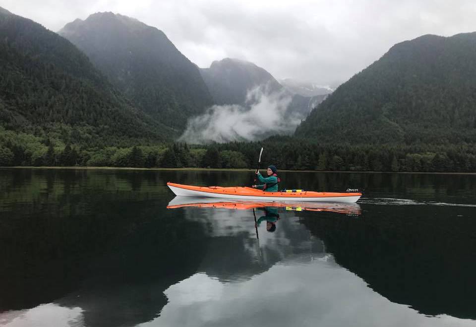 Haddow credits regular infusions of outdoor activity in nature with helping to keep her MS in check. Here she streams through a mirror of water near Haida Gawaii, an archipelago off British Columbia's West Coast