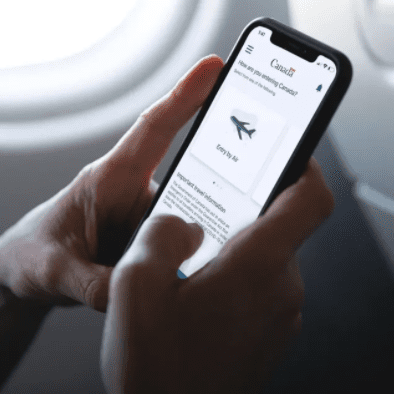 Person using travel app on smartphone
