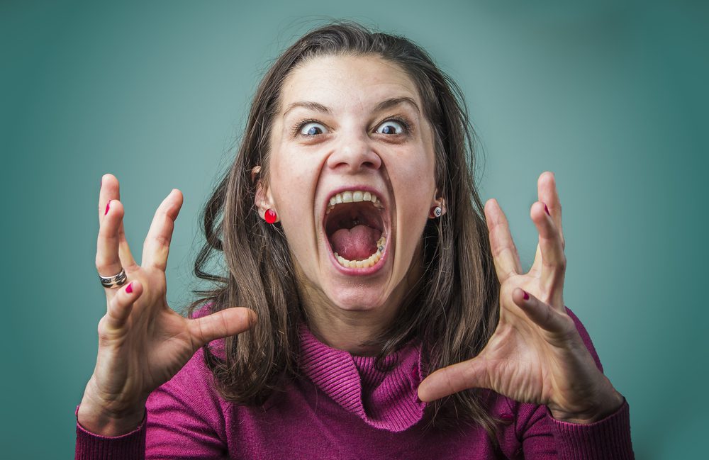 A woman yelling. Don't be afraid to use your voice and yell if you find yourself in a dangerous situation.