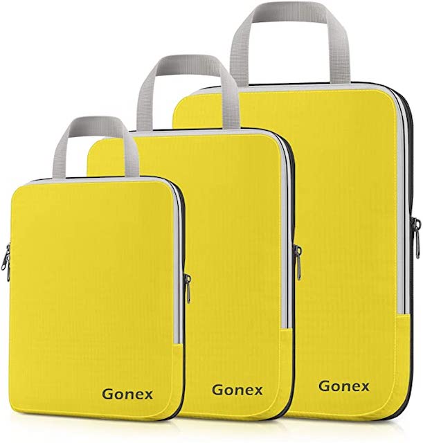 Three yellow Gonex packing cubes