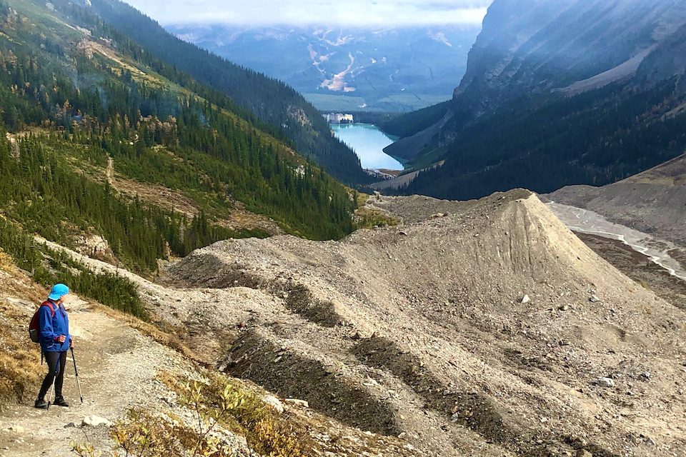 Don’t look back, unless the view is worth it. Linda Barnard admires the view of Lake Louise and the Fairmont Chateau Lake Louise from the Plain of Six Glaciers trail. Hans Pellikaan photo