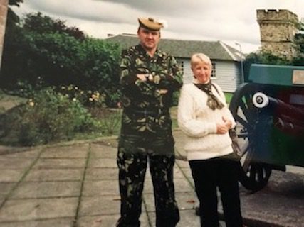 Joy with a soldier at Glencorse Barracks