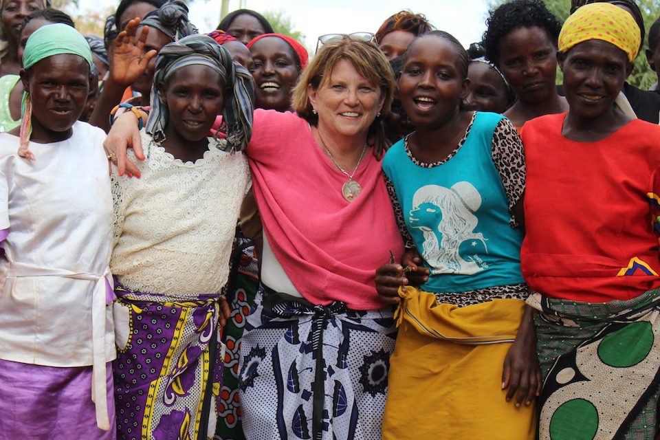 A group of women enjoying a culinary experience on a Women's Trip to Kenya