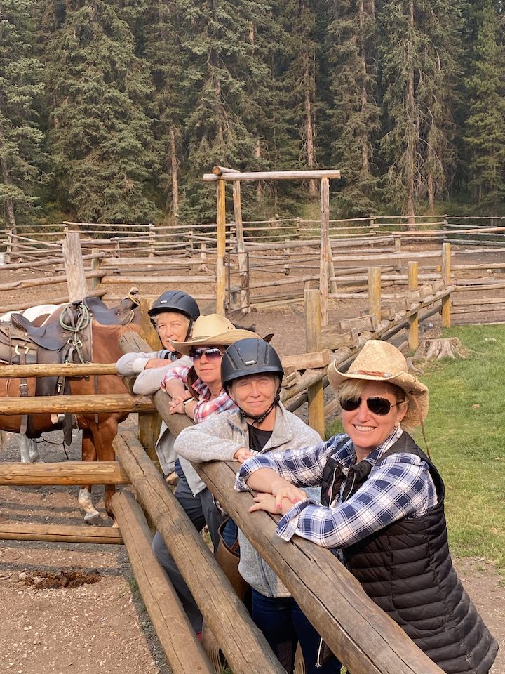 Women standing at a ranch in the Canadian Rockies