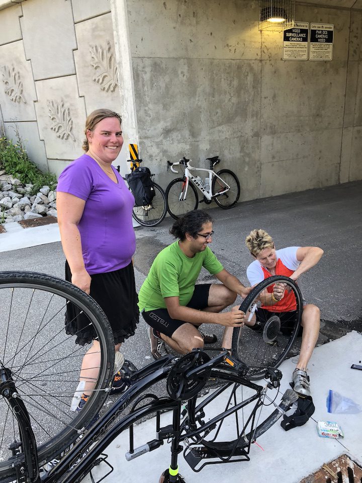 Knowing how to make your own repairs on the go in an important safety tip for solo rides, but on group rides, there's always someone ready to offer support