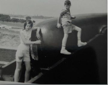 Wendy and her brother wandering on a family vacation at Ft McHenry historical site in Baltimore, USA.