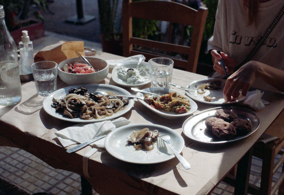 A meal of Greek food on a table