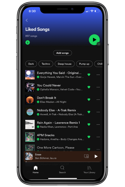 A cellphone showing liked songs on the Spotify app