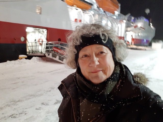 Mary Lou outside the MS Vesterålen while it was docked in Svolvær, Norway