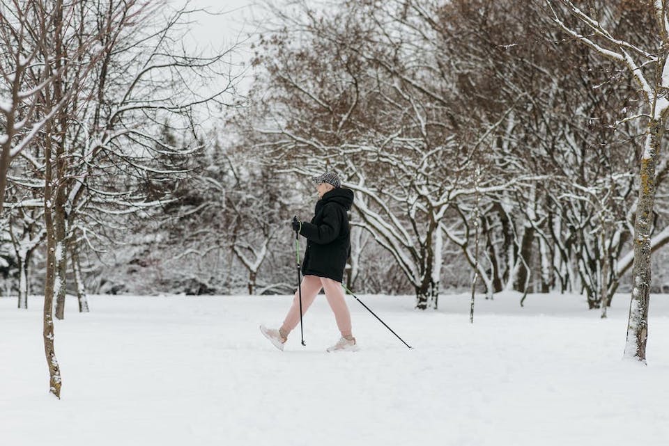 Older woman hiking in winter | Photo by Pavel Danilyuk on Pexels