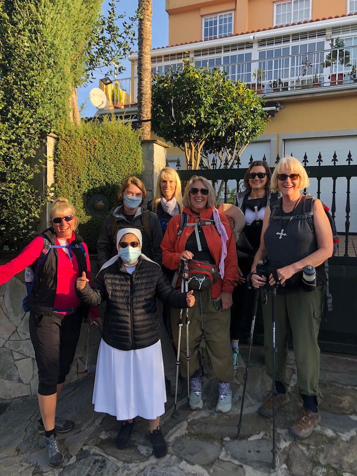 A group of women with a nun they met during their trek along the Camino de Santiago