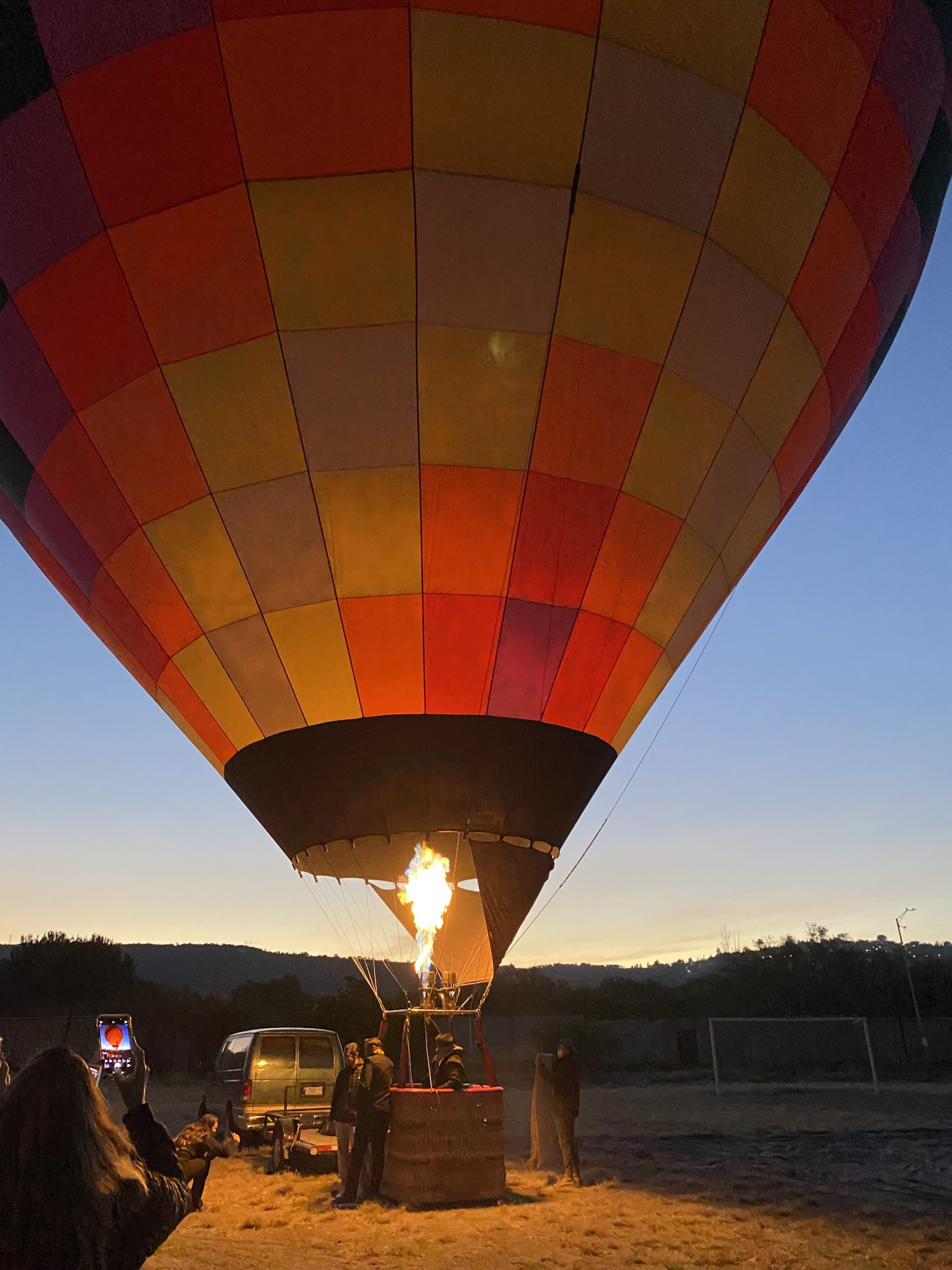 A hot air balloon being filled at dawn in an Miguel de Allende