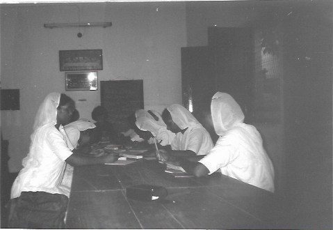 The sisters getting ready for English class with Suzanne as teacher