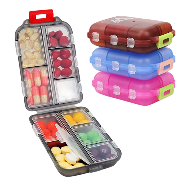 Four travel pill boxes