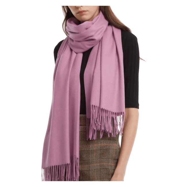 A woman wearing a purple travel scarf