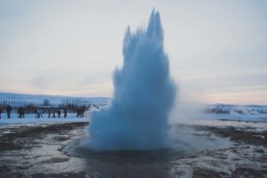Strokkur Geyser erupting in Iceland