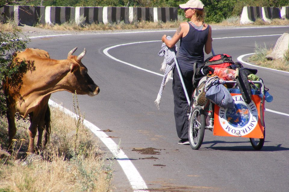 Angela Maxwell walking with her cart