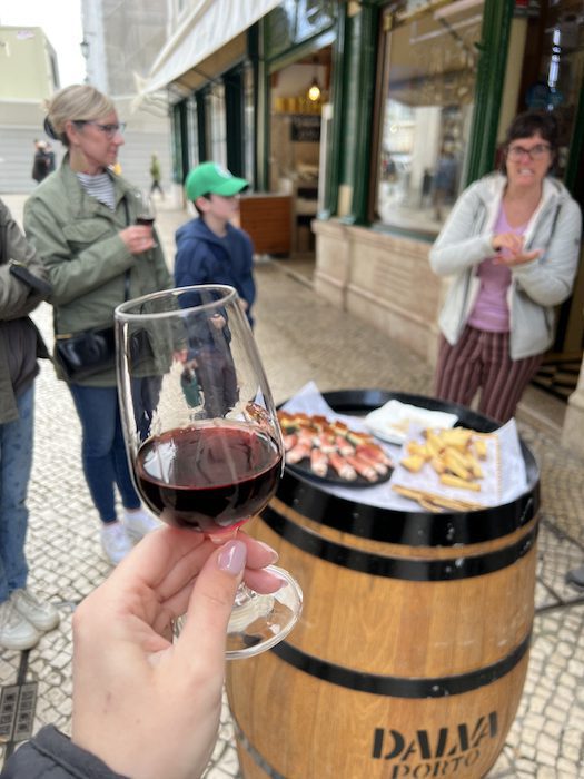 A glass of port on a food tour in Lisbon
