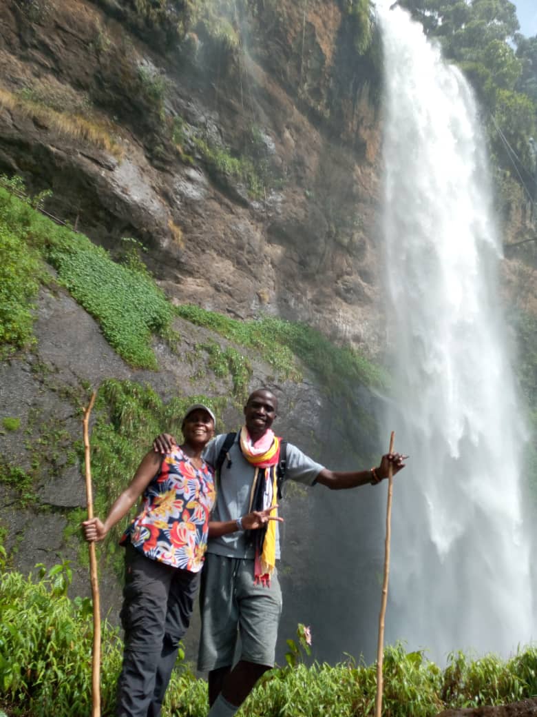 At Sipi Falls with her guide