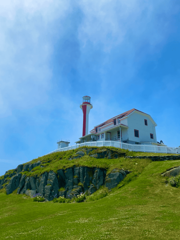 Cape Forchu Lighthouse, upon a green hill