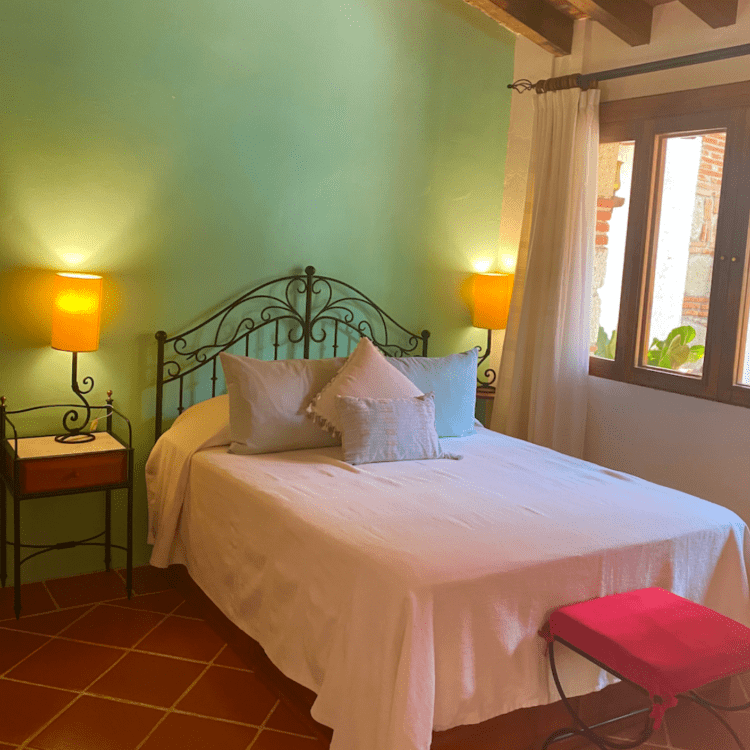 A bedroom in a casita located in Oaxaca, Mexico