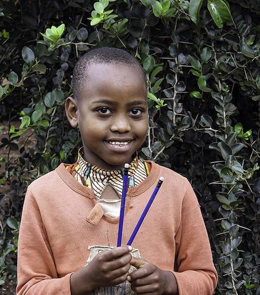 Tanzanian Girl with pencils