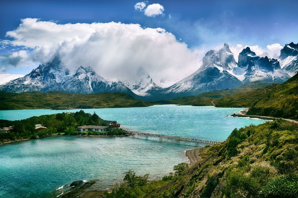 Landscape immage of Torres del Paine Patagonia with island in middle of lake and mountains in background