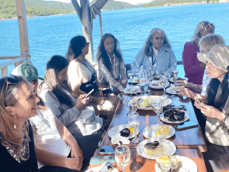 Group of women having seafood lunch on an Insight Vacations tour in Croatia