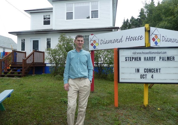 Kevin Blackmore in front of the House of Diamonds in Gander, Newfoundland