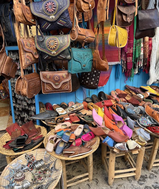 Various leather goods at a stall at a Moroccan souk