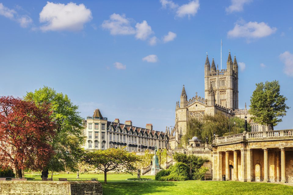 Bath Abbey on a fine spring day. On the right is the Colonnade, and on the left is Orange Grove. Somerset, England, UK