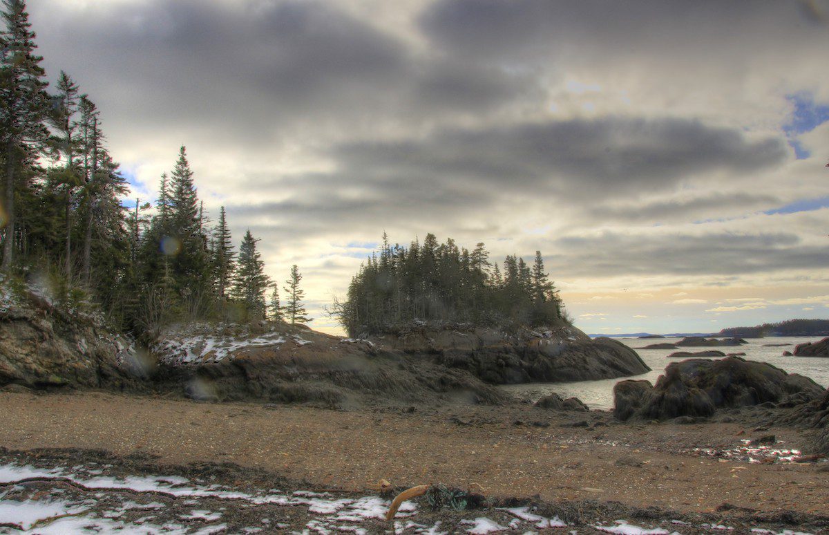 Tinkle Beach at the far left side of the ferry terminal at Blacks Harbour