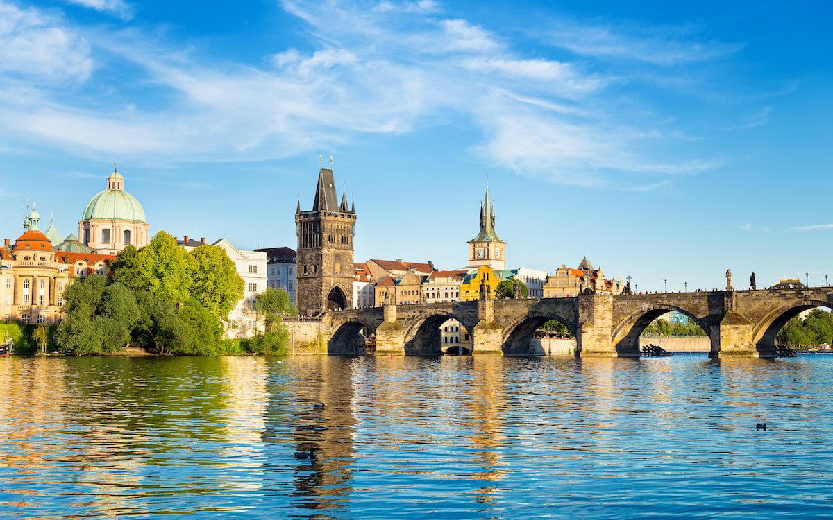 View of Charles Bridge and Lesser Bridge Tower in Prague, Czech Republic